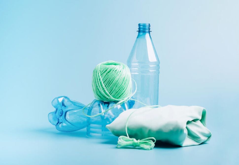 a few plastic bottles with recycled fabric from them